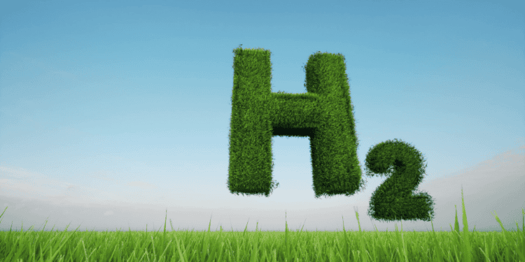 Letra H y símbolo H2 en un campo verde con cielo azul.